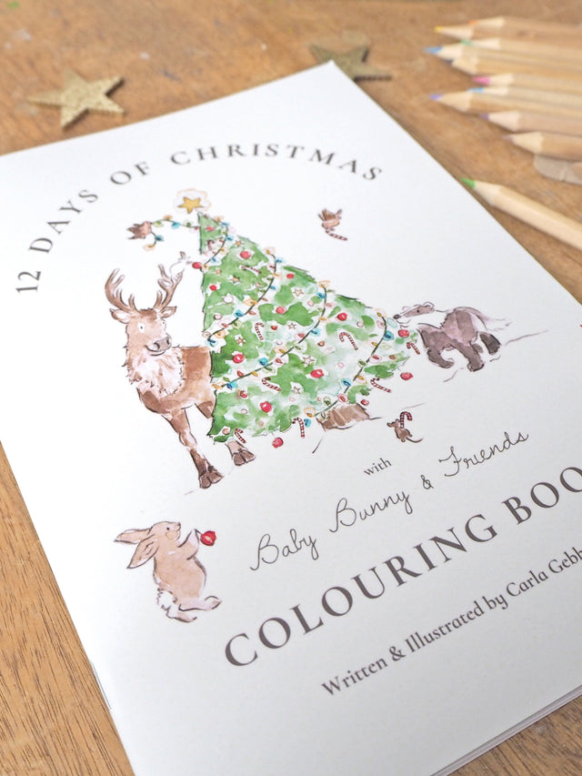 Christmas colouring book, by Carla Gebhard.