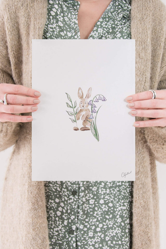 Floral print of a rabbit and bluebells, painted by Carla Gebhard.