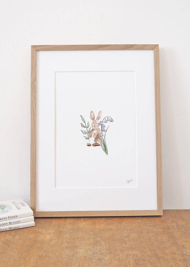 Framed watercolour art print of a rabbit and bluebells, painted by Carla Gebhard.
