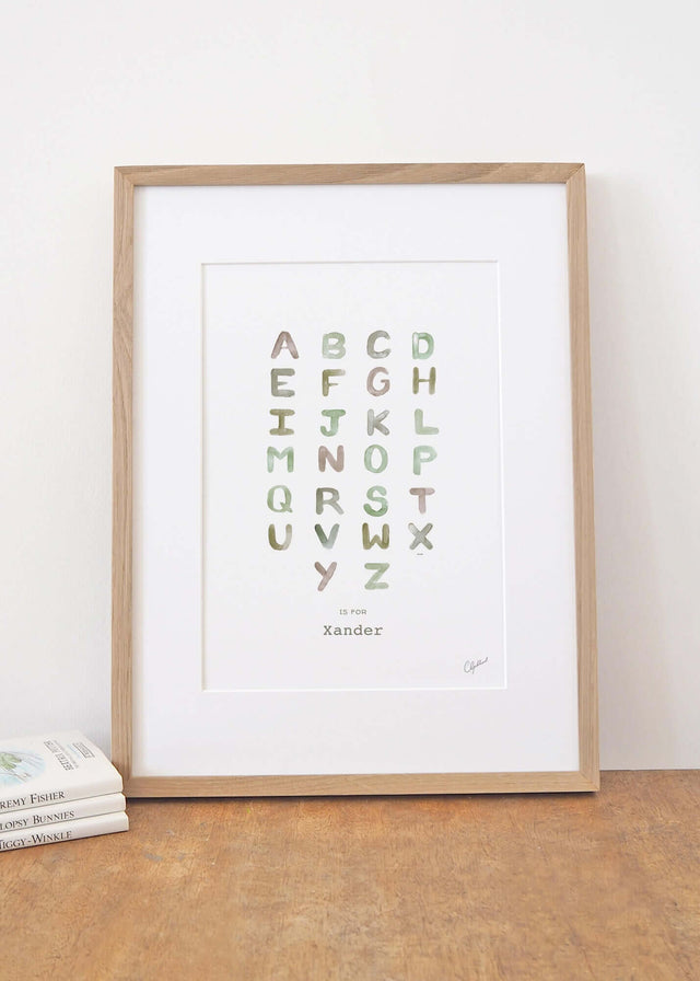 Kid's personalised alphabet print in green, by Carla Gebhard.